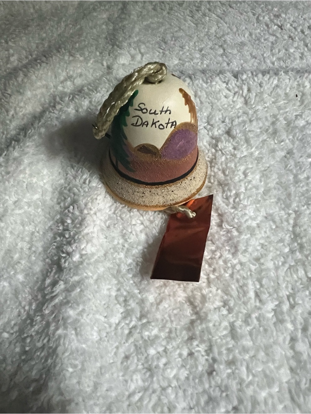 South Dakota Painted Sandstone Bell Ornament in Multicolor